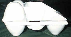 Attach the two cup strip and base of the dump truck.