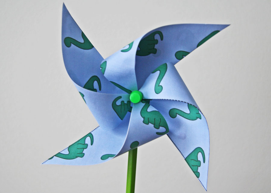dinosaur-themed paper pinwheel craft