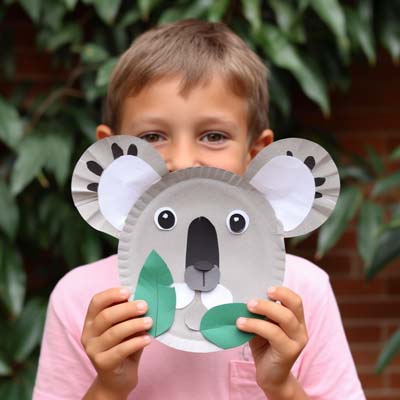 Paper Plate Koala Craft held by a child