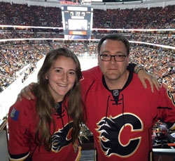 Father and Daughter at a Hockey Game