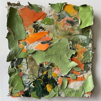 paper covered in green and orange scraps to make an abstract collage sheet.