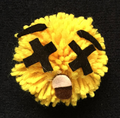 wool pompom emoji: dizzy