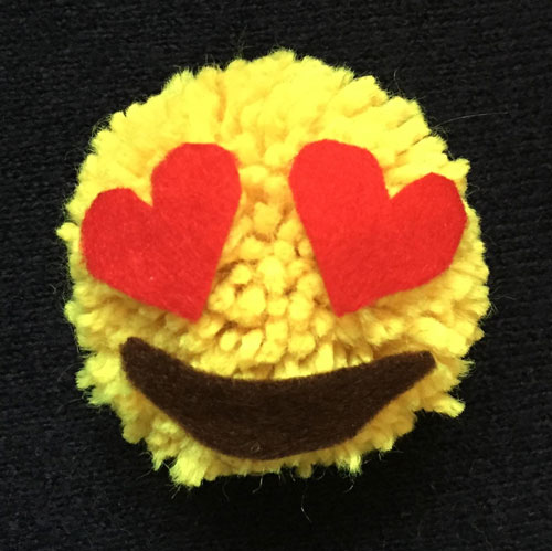 wool pompom emoji: heart eyes