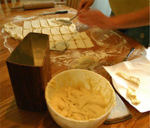 Mix the dough, roll it out and cut into strips.