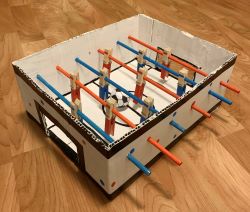 Craft yourself a Mini Foosball Table and play with your friend all day long!